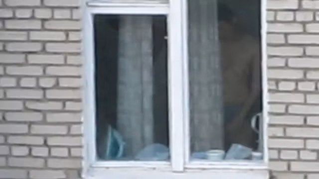 Hot brunette chick window peek