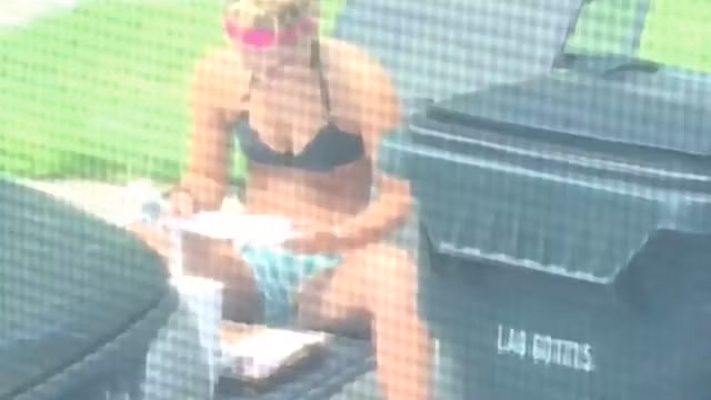 Emily tanning