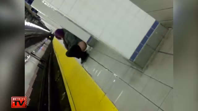 Wicked purple-haired babe makes water at the subway