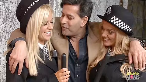 Two Blonde Milf Police Officers Arrest A Guy And Take Him To The Back Alley For A Threesome