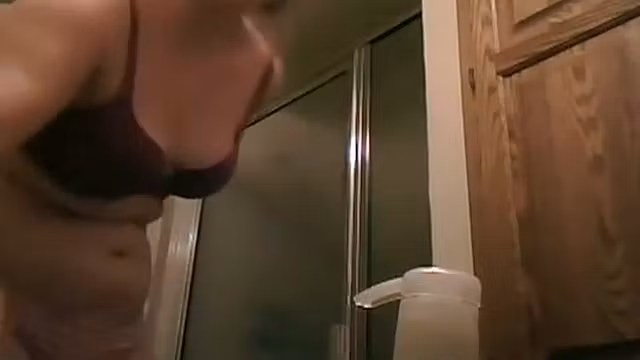 Chubby girl showers on a