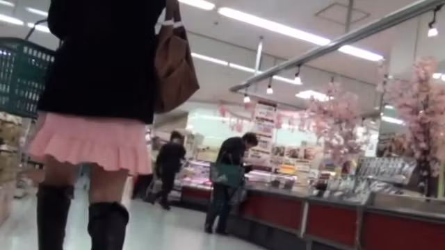 Asian spied on in shop