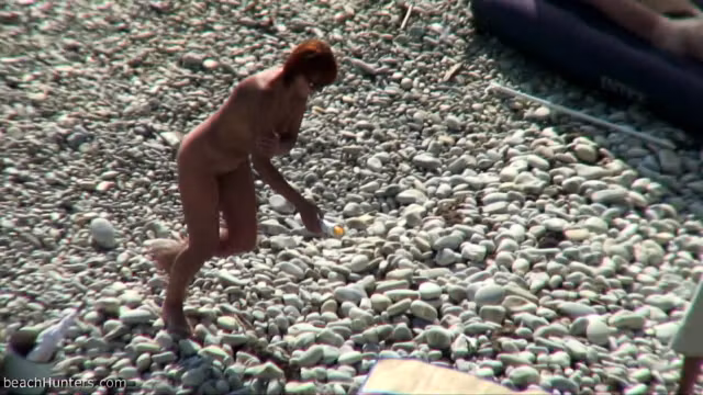 Amateur video of Couple at a public beach nude