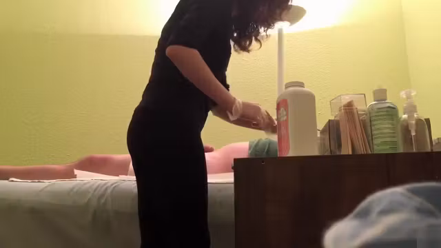 reveals a wax master giving handjob to horny client