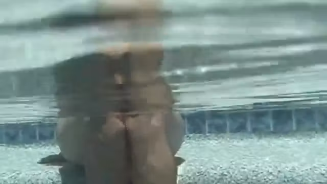 Babe on lilo naked in the sun