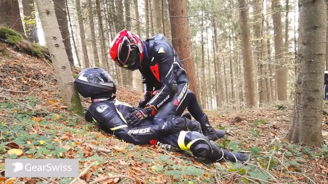 German dainese bikers having fun in the wood