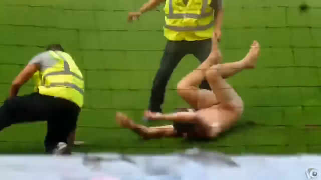 Nude maniac runs around the football field