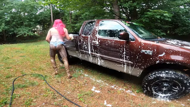 Gigantic Fake Tits Crossdresser Car Wash