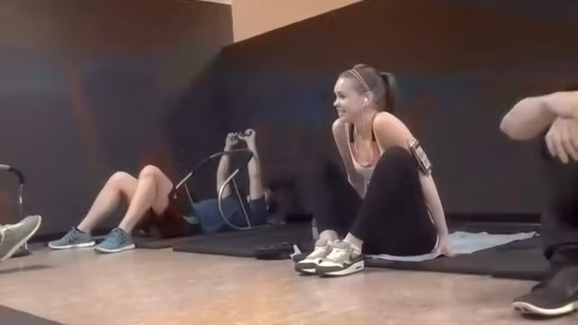 Stretchy girl does full splits