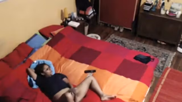 Bored girl watches the television