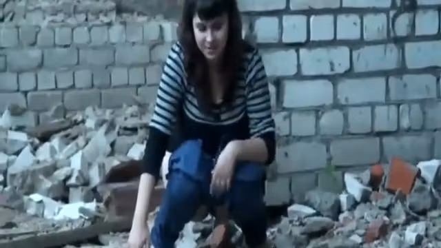 Women caught pissing in an old building