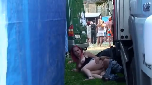 punks caught copulating outdoors behind two trucks