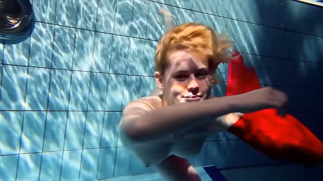 Hot blonde Lucie French teen in the pool