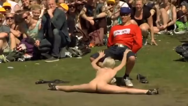 Striptease in front of massive audience
