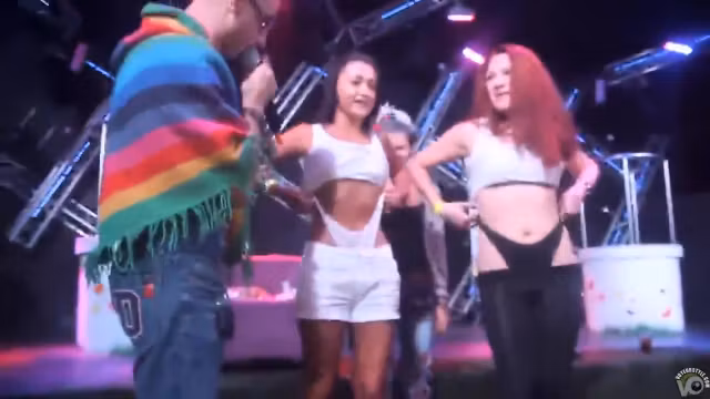 Bombastic girls pull up their thongs on the stage