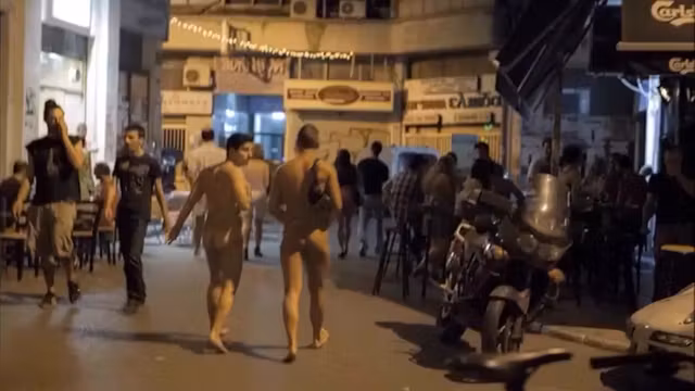 I enjoyed walking around the town with my friend completely naked