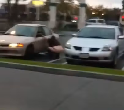 Security cam shoots amateur pissing between two cars