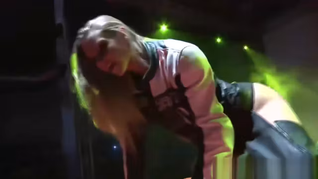 hot babe striptease on public stage