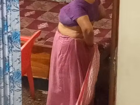 Aunty caught red handed on camera while changing dress.