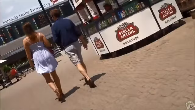 Horny tourist takes a peek under the lady's skirt