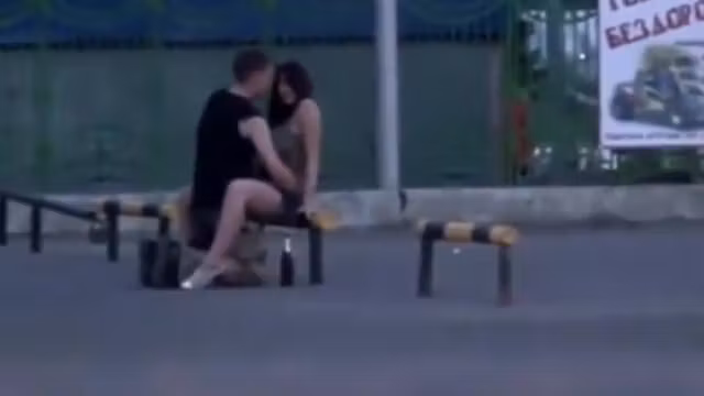 Young couple caught trying an odd pose