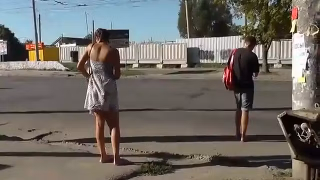 Peeping under a teenage beauty's skirt