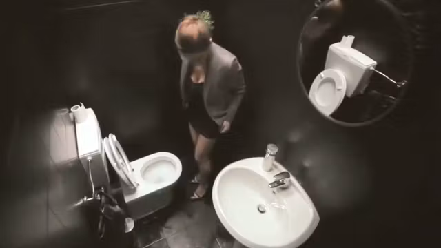 Public service announcement with a woman using a toilet