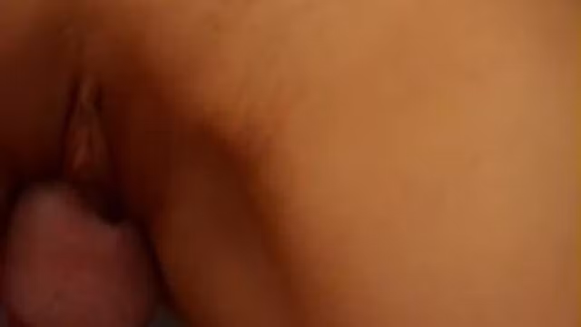 Small asian girl plays with her dildo on her bed