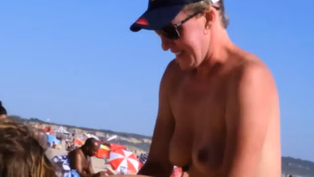Voyeur outdoor bj on the beach