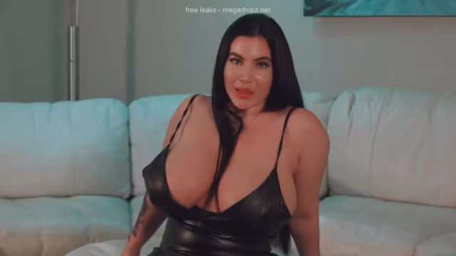 Masturbates In Her Latex Dress
