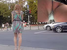 Young peach presents bubble ass in upskirt in public