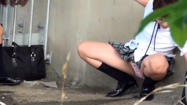 Asian classmates urinate