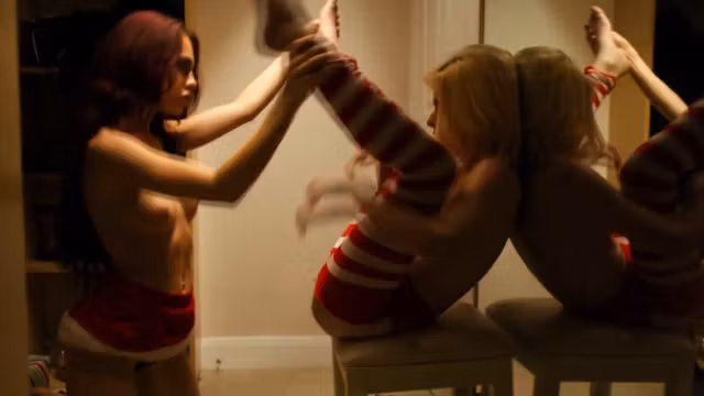Dyke teen licks friend during xmas party