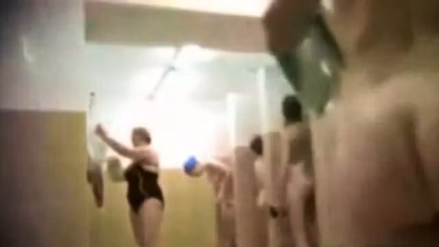 Teens and moms in public shower room