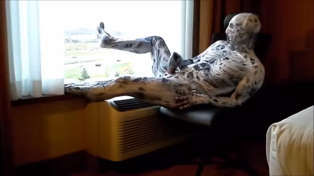 arachnaphobia zentai cums into black condom