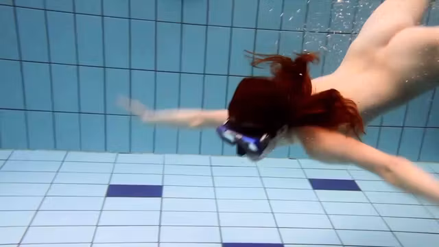 Big tits brunette Mia underwater naked