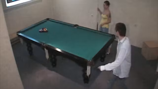 Free action from amateur couple on the billiard table