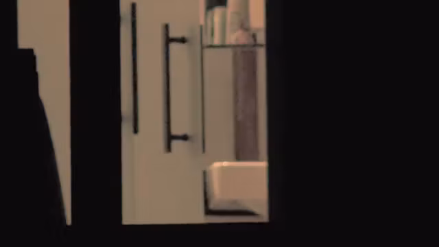 Naked girl washing her face and thru window